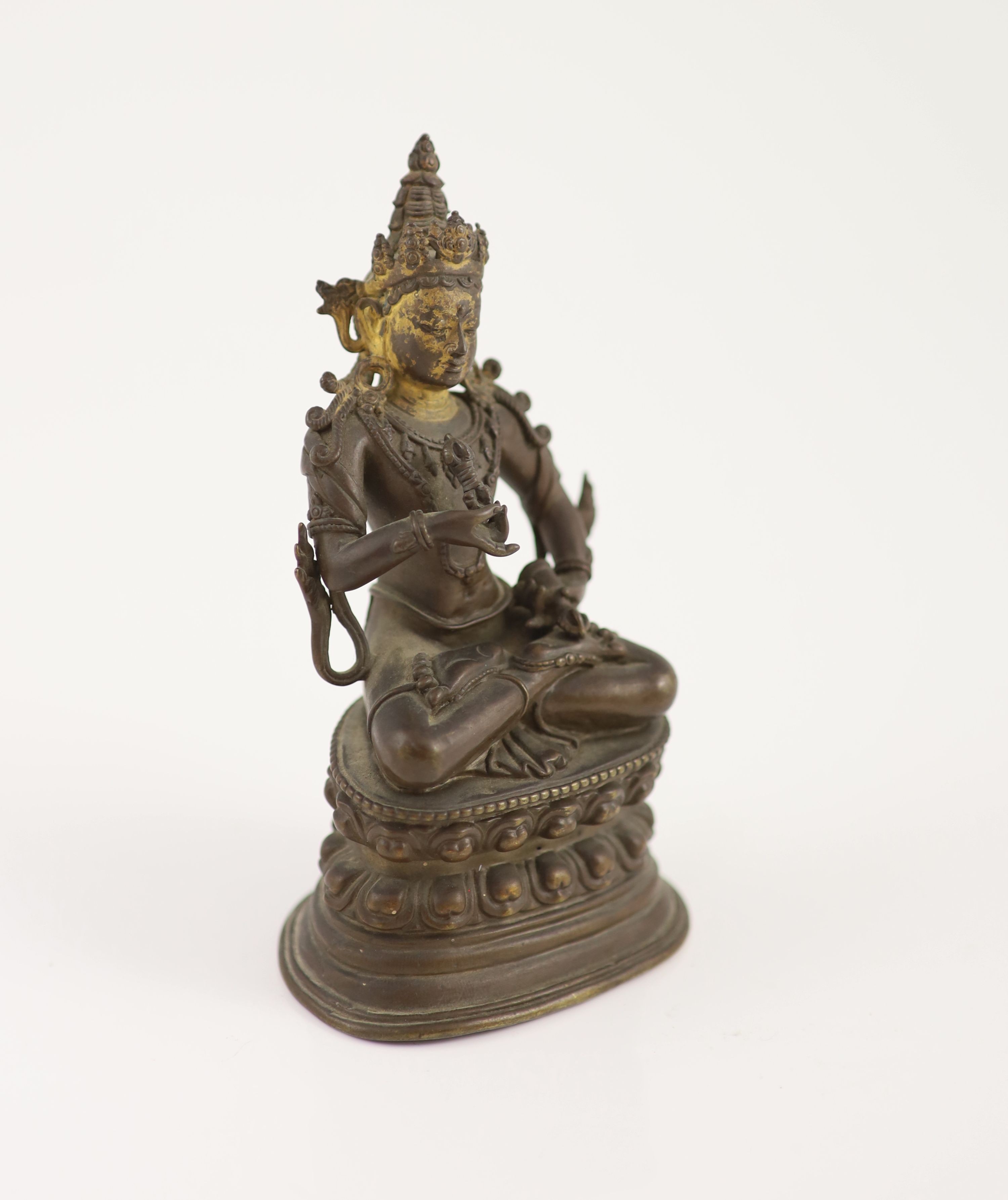 A Himalayan bronze seated figure of Vajrasattva, 18th/19th century, 15.5 cm high